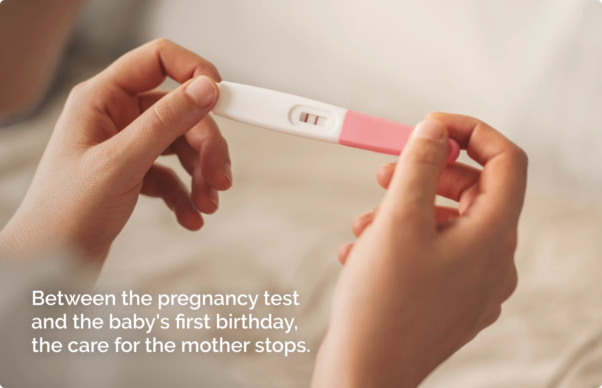 Adoré key visual — hands holding a positive pregnancy test, with the line Between the pregnancy test and the baby's first birthday, the care for the mother stops